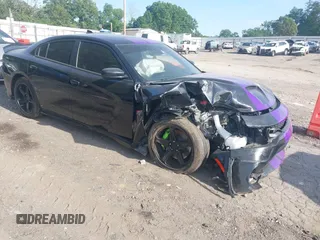 2021 Dodge Charger Scat Pack Widebody z VIN 2C3CDXGJ3MH562134, wystawiony jako IAAI lot #42214044 z przebiegiem 56 514 mil mil oraz . Historia ofert i sprzedaży dostępna na DreamBid. Obrazek 1.