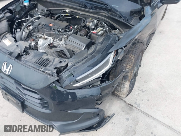 2024 Honda HR-V Sport z VIN 3CZRZ1H53RM707679, wystawiony jako IAAI lot #42041371 z przebiegiem 32 383 mil mil oraz . Historia ofert i sprzedaży dostępna na DreamBid. Obrazek 6.