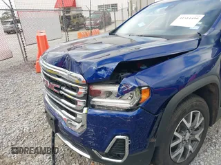 2023 GMC Acadia SLT with VIN 1GKKNML4XPZ209059, listed as a IAAI auction lot 41514499 with 45,245 mi miles and . Bid and sale history available at DreamBid. Image 6.