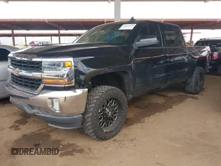 2017 Chevrolet Silverado 1500 LT with VIN 3GCPCREC7HG360001, listed as a IAAI auction lot 42202189 with 92,438 mi miles and . Bid and sale history available at DreamBid. Image 2.