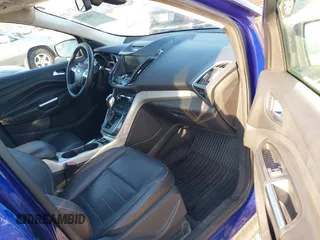 2013 Ford Escape SEL with VIN 1FMCU9HX5DUB24167, listed as a IAAI auction lot 41789266 with 130,608 mi miles. Bid and sale history available at carsss.com. Image 5.