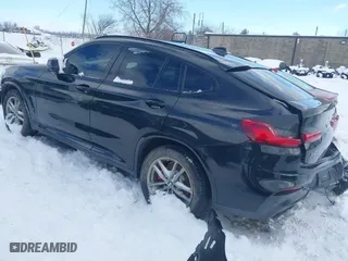 2021 BMW X4 M40i with VIN 5UX2V5C05M9H02711, listed as a IAAI auction lot 41675953 with 26,652 mi miles. Bid and sale history available at carsss.com. Image 3.