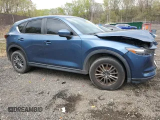 2017 Mazda CX-5 Touring with VIN JM3KFBCL3H0163513, listed as a Copart auction lot 53090045 with 151,675 mi miles and Clean Title. Bid and sale history available at carsss.com. Image 4.