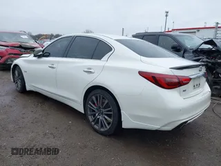 2020 Infiniti Q50 Red Sport 400 with VIN JN1FV7AR0LM660315, listed as a IAAI auction lot 41951851 with 102,475 mi miles and . Bid and sale history available at carsss.com. Image 3.