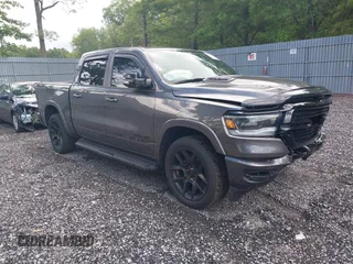 2021 Ram 1500 Laramie with VIN 1C6SRFJT8MN736615, listed as a IAAI auction lot 42657835 with 48,020 mi miles and . Bid and sale history available at DreamBid. Image 1.