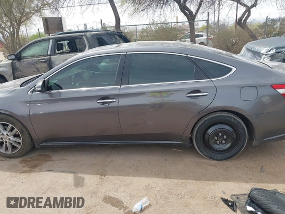 2014 Toyota Avalon Limited with VIN 4T1BK1EB1EU101787, listed as a IAAI auction lot 41949977 with 137,837 mi miles. Bid and sale history available at carsss.com. Image 15.