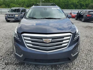 2019 Cadillac XT5 Luxury FWD with VIN 1GYKNCRSXKZ101832, listed as a Copart auction lot 54574825 with Not provided miles and Salvage title. Bid and sale history available at DreamBid. Image 5.