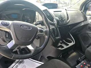 2015 Ford Transit Cargo with VIN 1FTNR1ZM3FKA45034, listed as a IAAI auction lot 42241072 with 100,506 mi miles and . Bid and sale history available at DreamBid. Image 1.