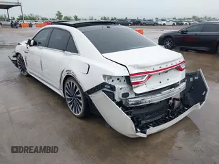 2017 Lincoln Continental Black Label z VIN 1LN6L9BC6H5636770, wystawiony jako IAAI lot #41959079 z przebiegiem 53 359 mil mil oraz . Historia ofert i sprzedaży dostępna na DreamBid. Obrazek 3.
