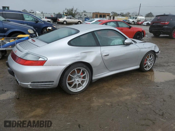 2003 Porsche 911 z VIN WP0AA29983S620988, wystawiony jako Copart lot #49378715 z przebiegiem 99 291 mil mil oraz Szkoda całkowita • Salvage title. Historia ofert i sprzedaży dostępna na DreamBid. Obrazek 3.