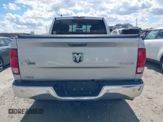 2018 Ram 1500 Big Horn z VIN 1C6RR7GG6JS231331, wystawiony jako IAAI lot #41858511 z przebiegiem 64 514 mil mil oraz . Historia ofert i sprzedaży dostępna na DreamBid. Obrazek 16.