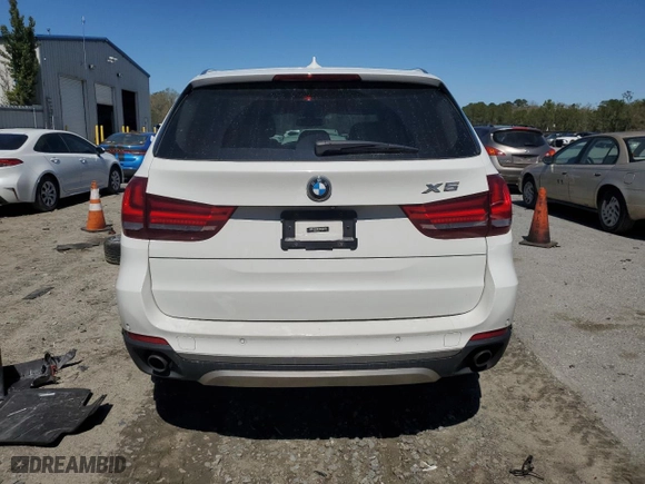 2015 BMW X5 xDrive35d with VIN 5UXKS4C57F0N10564, listed as a Copart auction lot 49235615 with 118,828 mi miles and Salvage Title. Bid and sale history available at carsss.com. Image 6.