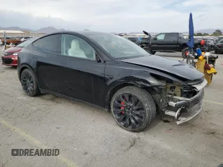 2022 Tesla Model Y Performance with VIN 7SAYGDEF1NF407985, listed as a Copart auction lot 53831325 with 41,225 mi miles and Salvage title. Bid and sale history available at DreamBid. Image 4.