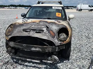 2015 MINI Hardtop 4 Door S z VIN WMWXU3C50F2B56953, wystawiony jako Copart lot #58579615 z przebiegiem Nie podano mil oraz Szkoda całkowita • Salvage title. Historia ofert i sprzedaży dostępna na DreamBid. Obrazek 13.