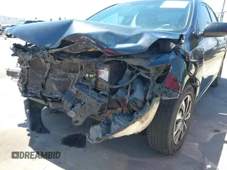 2010 Toyota Corolla with VIN 1NXBU4EE3AZ307385, listed as a IAAI auction lot 42465219 with 201,105 mi miles and . Bid and sale history available at DreamBid. Image 6.