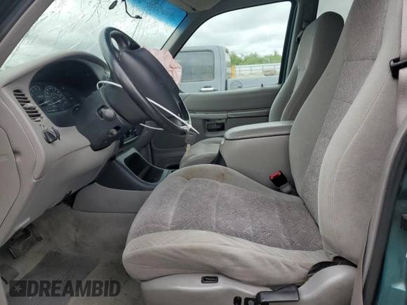 1998 Ford Explorer XL with VIN 1FMZU34E8WZB07364, listed as a Copart auction lot 51261845 with 98,429 mi miles and Salvage title. Bid and sale history available at DreamBid. Image 7.