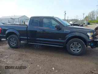 2015 Ford F-150 XLT with VIN 1FTEX1EP1FFC73368, listed as a IAAI auction lot 42036914 with 114,916 mi miles. Bid and sale history available at carsss.com. Image 13.