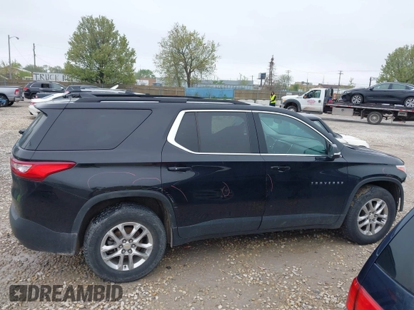 2021 Chevrolet Traverse LT with VIN 1GNERHKW0MJ218426, listed as a IAAI auction lot 42178273 with 76,545 mi miles and . Bid and sale history available at DreamBid. Image 13.