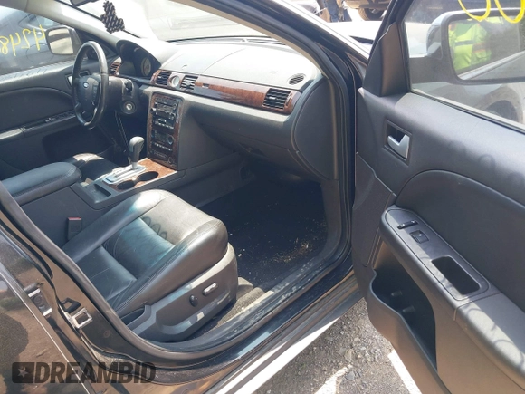 2007 Ford Five Hundred Limited with VIN 1FAHP25127G134527, listed as a IAAI auction lot 42480300 with 205,946 mi miles and . Bid and sale history available at DreamBid. Image 5.