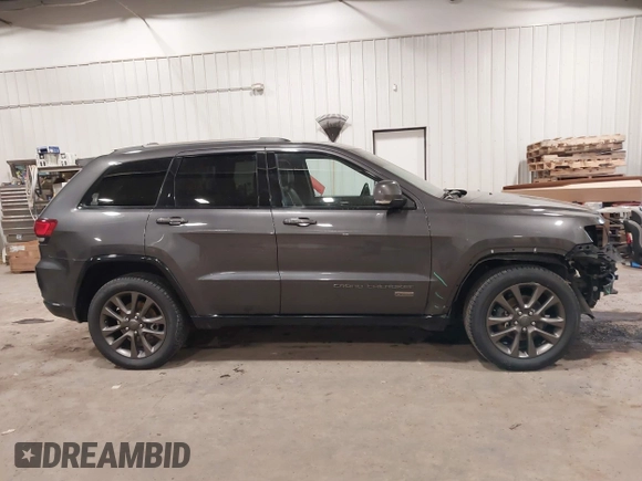 2016 Jeep Grand Cherokee Limited 75th Anniversary with VIN 1C4RJFBG2GC349154, listed as a IAAI auction lot 41392239 with 135,627 mi miles and . Bid and sale history available at DreamBid. Image 13.