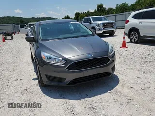 2018 Ford Focus SE with VIN 1FADP3F25JL331038, listed as a Copart auction lot 60235395 with 37,038 mi miles and Salvage title. Bid and sale history available at DreamBid. Image 13.