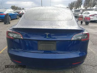 2023 Tesla Model 3 with VIN 5YJ3E1EA0PF518983, listed as a IAAI auction lot 41749225 with 26,748 mi miles and . Bid and sale history available at DreamBid. Image 17.