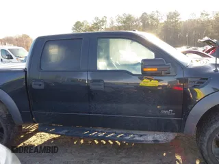 2014 Ford F-150 SVT Raptor with VIN 1FTFW1R60EFC90847, listed as a IAAI auction lot 41823834 with 169,549 mi miles and . Bid and sale history available at carsss.com. Image 12.