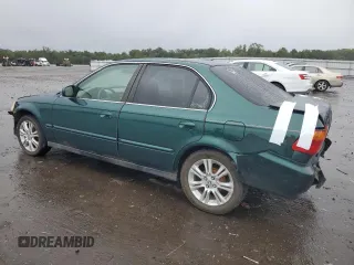 2000 Honda Civic EX with VIN 1HGEJ8641YL022645, listed as a Copart auction lot 73574474 with 285,937 mi miles and Salvage Title. Bid and sale history available at carsss.com. Image 2.