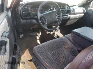 1999 Dodge Ram 2500 with VIN 3B7KF22Z5XG103192, listed as a Copart auction lot 71481004 with 84,985 mi miles and Salvage Title. Bid and sale history available at carsss.com. Image 8.