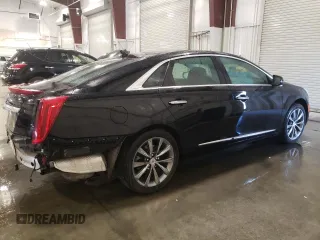 2014 Cadillac XTS Luxury with VIN 2G61N5S33E9246454, listed as a Copart auction lot 63100655 with 110,544 mi miles and Salvage title. Bid and sale history available at DreamBid. Image 3.