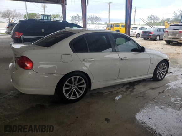 2011 BMW 3 Series 328i with VIN WBAPH7G50BNN06710, listed as a Copart auction lot 76987974 with 157,514 mi miles and Salvage Title. Bid and sale history available at carsss.com. Image 3.