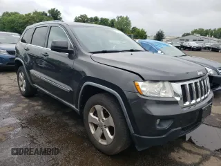 2011 Jeep Grand Cherokee Laredo with VIN 1J4RR4GG1BC737808, listed as a Copart auction lot 61305565 with 188,067 mi miles and Clean title. Bid and sale history available at DreamBid. Image 4.