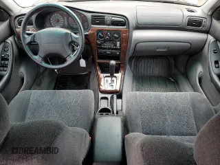 2000 Subaru Legacy with VIN 4S3BE6451Y7207874, listed as a Copart auction lot 59583325 with 57,861 mi miles and Salvage title. Bid and sale history available at DreamBid. Image 8.
