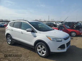 2014 Ford Escape SE with VIN 1FMCU9G97EUD45872, listed as a Copart auction lot 52204605 with 205,112 mi miles and Salvage Title. Bid and sale history available at carsss.com. Image 4.