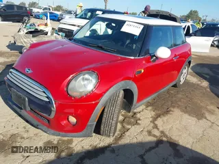 2014 MINI Hardtop with VIN WMWXM5C53ET933238, listed as a IAAI auction lot 41871315 with 83,788 mi miles and . Bid and sale history available at DreamBid. Image 2.