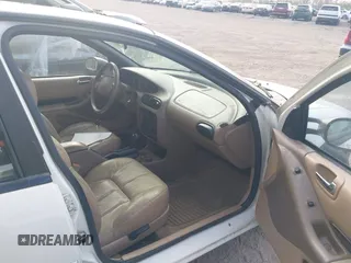 1999 Chrysler Cirrus LXi z VIN 1C3EJ56HOXN510315, wystawiony jako IAAI lot #42056205 z przebiegiem 178 344 mil mil oraz . Historia ofert i sprzedaży dostępna na DreamBid. Obrazek 5.