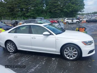 2014 Audi A6 Prestige with VIN WAUHGAFCXEN091050, listed as a IAAI auction lot 42524560 with 169,575 mi miles and . Bid and sale history available at DreamBid. Image 13.