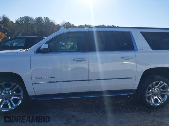 2017 GMC Yukon XL SLT z VIN 1GKS2GKC0HR207440, wystawiony jako IAAI lot #41715100 z przebiegiem 139 529 mil mil oraz . Historia ofert i sprzedaży dostępna na DreamBid. Obrazek 15.