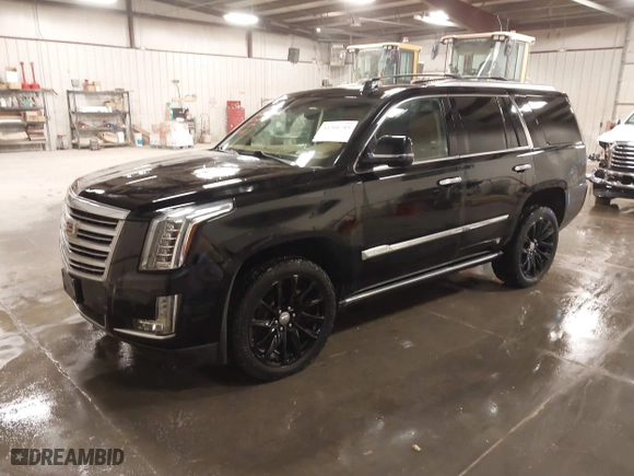 2015 Cadillac Escalade Platinum with VIN 1GYS4PKJ9FR745825, listed as a IAAI auction lot 41201715 with 133,363 mi miles. Bid and sale history available at carsss.com. Image 2.
