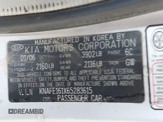 2006 Kia Spectra with VIN KNAFE161X65283615, listed as a IAAI auction lot 41955968 with 185,177 mi miles. Bid and sale history available at carsss.com. Image 9.
