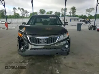 2012 Kia Sorento EX с VIN 5XYKU4A64CG261606, выставлен на аукционе Copart как лот 60863835 с пробегом 196 380 миль миль и Списание • Salvage title. История ставок и продаж доступна на DreamBid. Изображение 14.