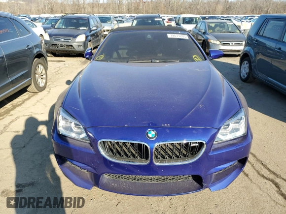 2015 BMW M6 z VIN WBSLZ9C55FD651441, wystawiony jako Copart lot #78511203 z przebiegiem 45 569 mil mil oraz Czysty tytuł • Clean title. Historia ofert i sprzedaży dostępna na DreamBid. Obrazek 5.
