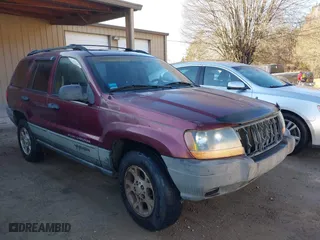 2001 Jeep Grand Cherokee Laredo with VIN 1J4GW48S11C578001, listed as a IAAI auction lot 41671318 with 263,694 mi miles. Bid and sale history available at carsss.com. Image 1.