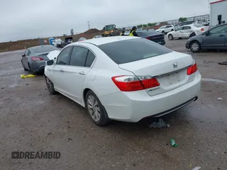 2014 Honda Accord EX-L with VIN 1HGCR2F82EA195419, listed as a IAAI auction lot 41967410 with 228,604 mi miles and . Bid and sale history available at carsss.com. Image 3.