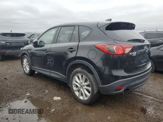 2013 Mazda CX-5 Grand Touring with VIN JM3KE4DE8D0161586, listed as a Copart auction lot 52641145 with 134,290 mi miles and Salvage Title. Bid and sale history available at carsss.com. Image 2.
