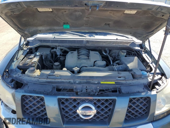 2005 Nissan Armada LE z VIN 5N1AA08A05N710696, wystawiony jako Copart lot #46854495 z przebiegiem 211 883 mil mil oraz Szkoda całkowita • Salvage title. Historia ofert i sprzedaży dostępna na DreamBid. Obrazek 12.