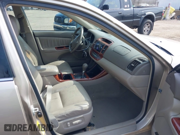 2004 Toyota Camry LE with VIN 4T1BF30K94U587836, listed as a IAAI auction lot 41714277 with 211,893 mi miles and . Bid and sale history available at carsss.com. Image 5.