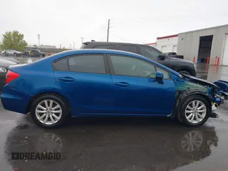 2012 Honda Civic EX with VIN 2HGFB2F89CH537142, listed as a IAAI auction lot 42024927 with 123,063 mi miles and . Bid and sale history available at DreamBid. Image 14.
