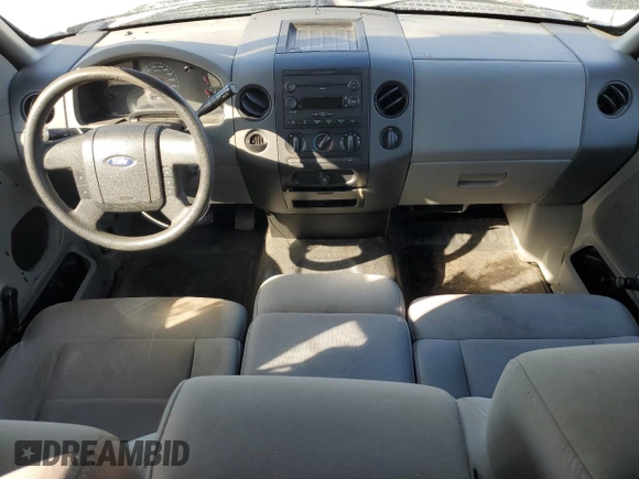 2007 Ford F-150 STX with VIN 1FTRX12W97FA65608, listed as a Copart auction lot 83752084 with 121,052 mi miles and Salvage Title. Bid and sale history available at DreamBid. Image 8.
