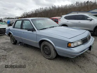 1994 Oldsmobile Cutlass Ciera S z VIN 1G3AG55M1R6362731, wystawiony jako Copart lot #83832424 z przebiegiem 145 973 mil mil oraz Szkody całkowita. Historia ofert i sprzedaży dostępna na DreamBid. Obrazek 4.